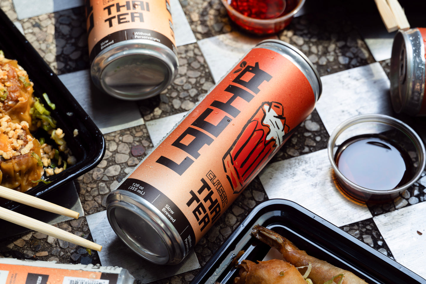 Lacha Thai Iced Tea Can with takeout food