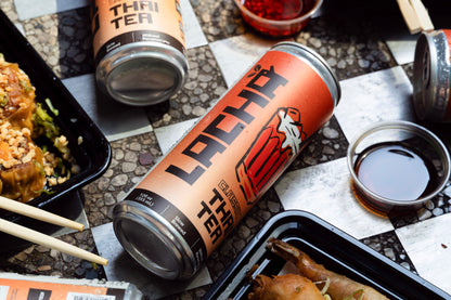 Lacha Thai Iced Tea Can with takeout food