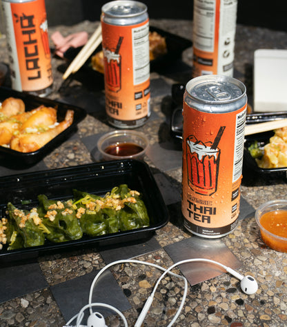 Lacha Thai Iced Tea Can with takeout food